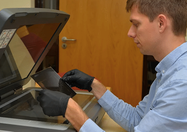 How Do You Digitize Fragile Negatives and Glass Plates Without Causing Damage?